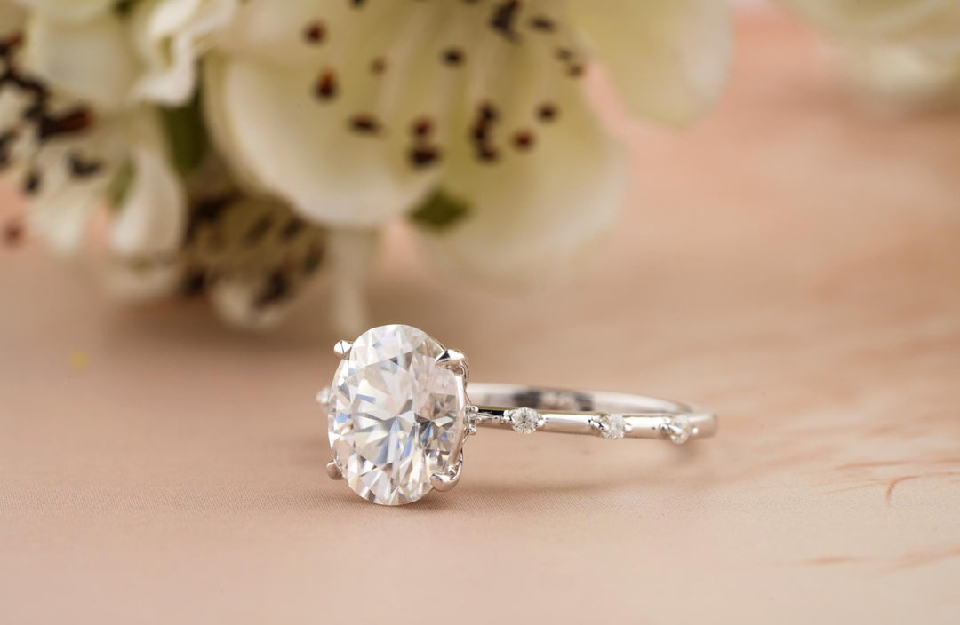 Oval pave engagement ring photographed in natural light