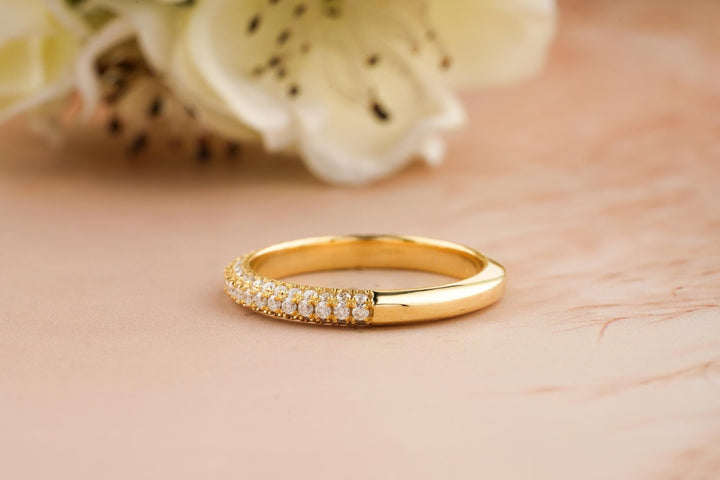 Round diamond wedding band in rose gold
