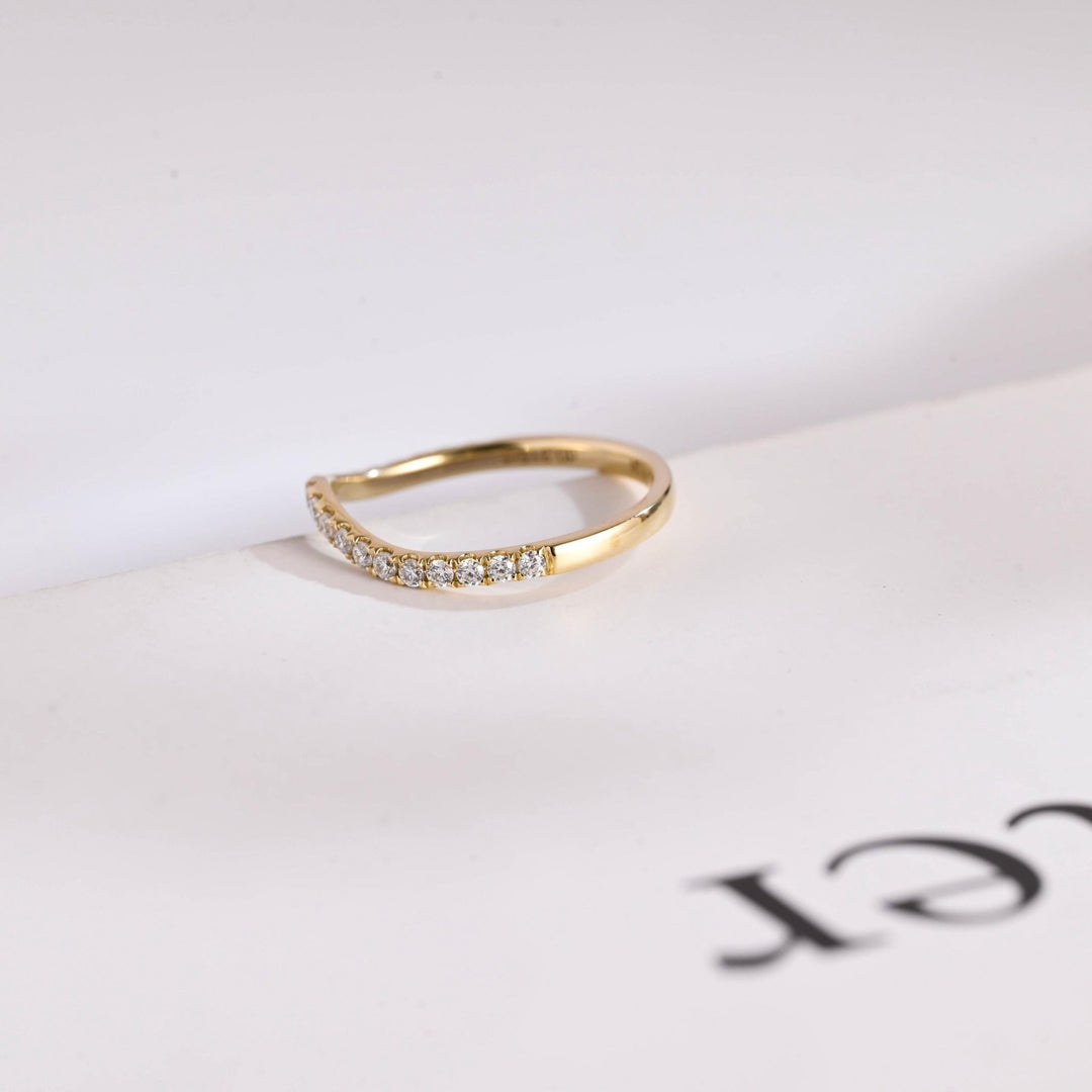 Round lab grown diamond band worn on hand