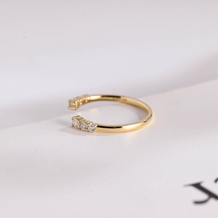 Side view of round diamond wedding band