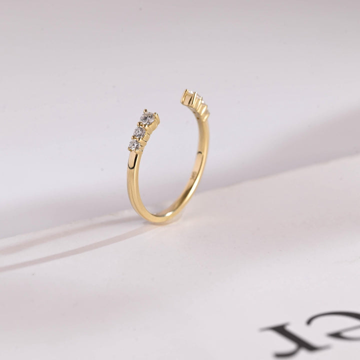 Round lab grown diamond band worn on hand