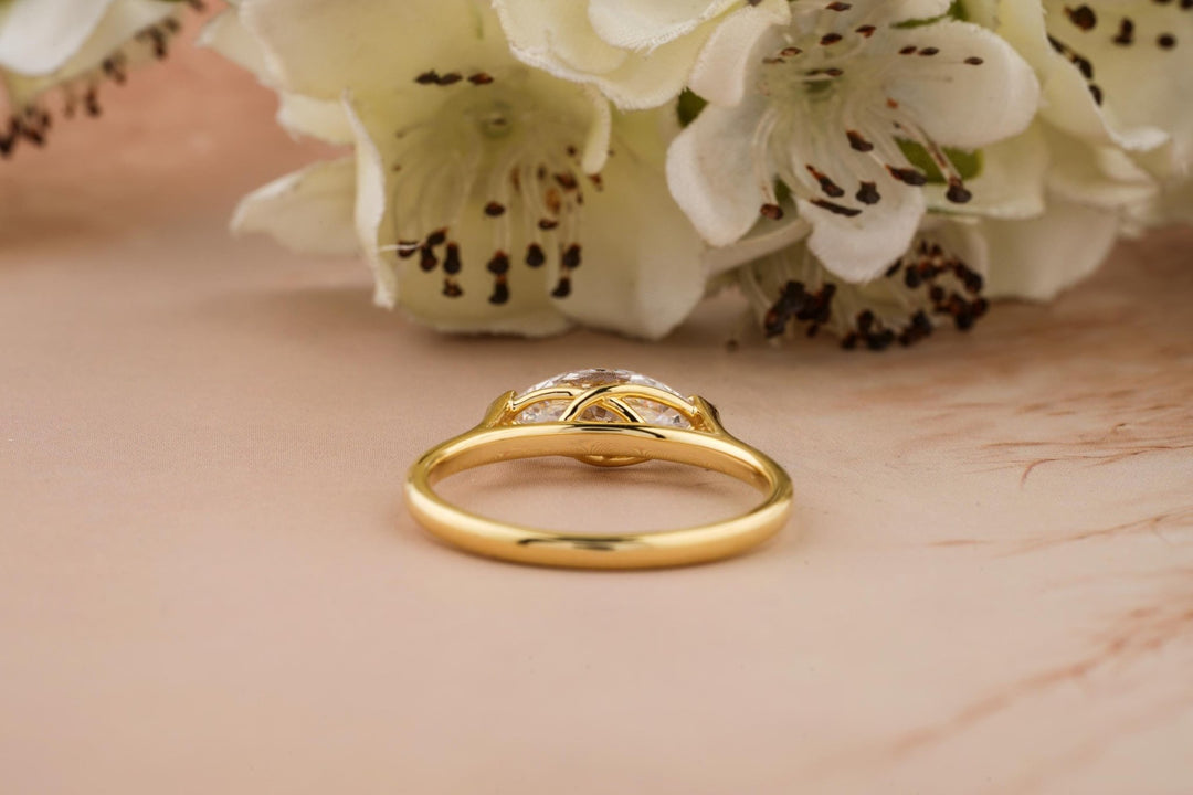 Marquise east west engagement ring close-up highlighting diamond sparkle