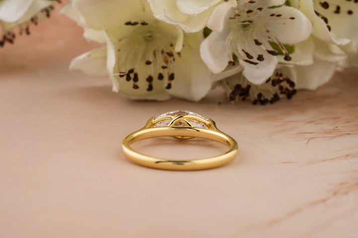Marquise east west engagement ring close-up highlighting diamond sparkle