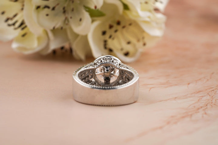 Round halo ring set with an IGI graded diamond