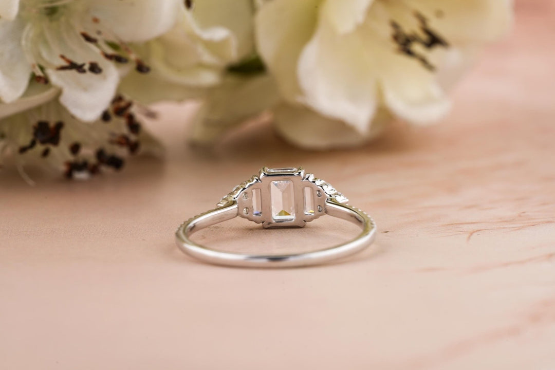 Close-up of emerald cut center diamond in solitaire engagement ring