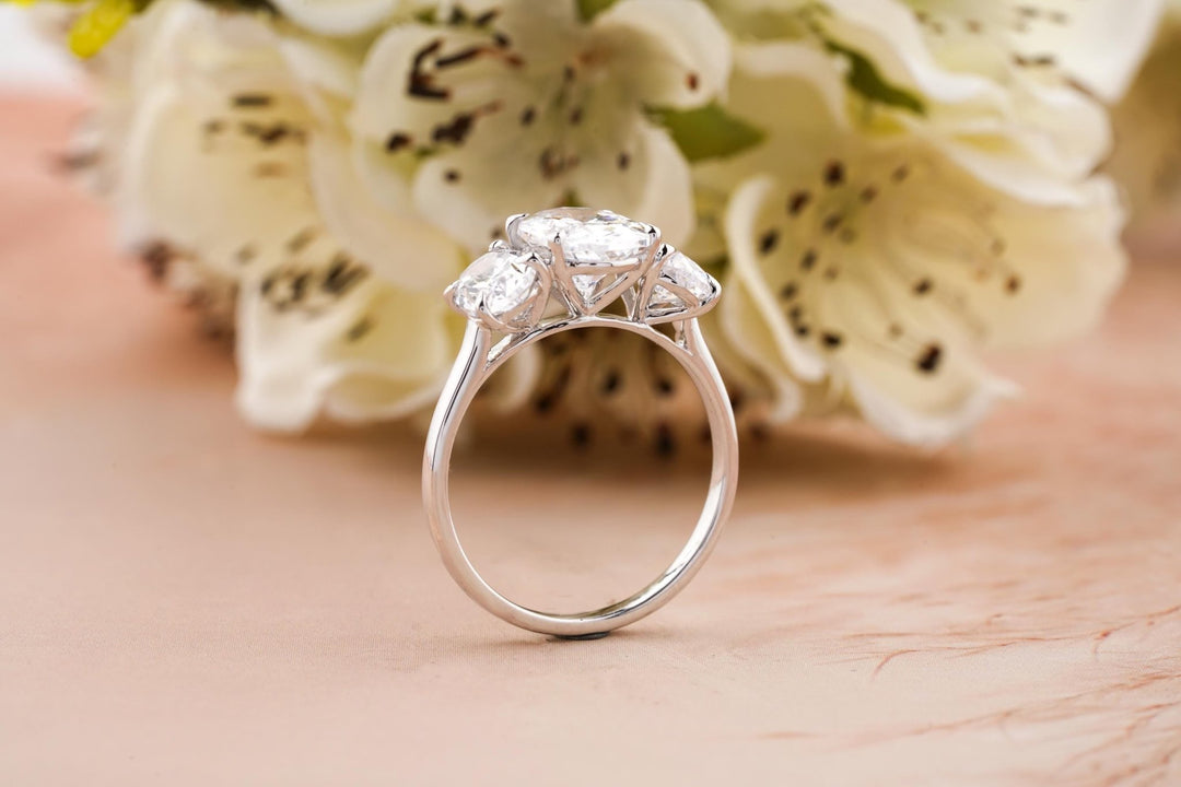 Oval solitaire lab grown diamond ring fitted on finger