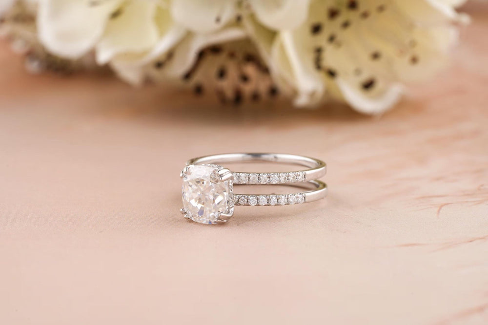 Cushion cut hidden halo engagement ring with IGI certified center diamond