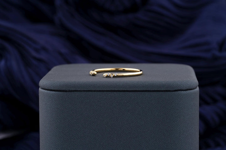 Round diamond band stacked with engagement ring