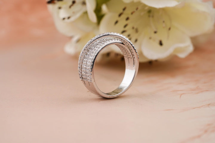 Round diamond band stacked with engagement ring
