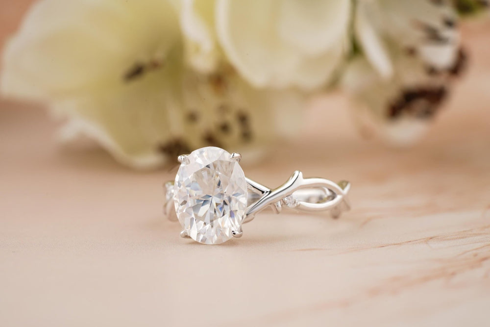 Unboxing view of oval cut solitaire diamond engagement ring