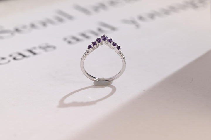 Ethically sourced emerald diamond eternity band