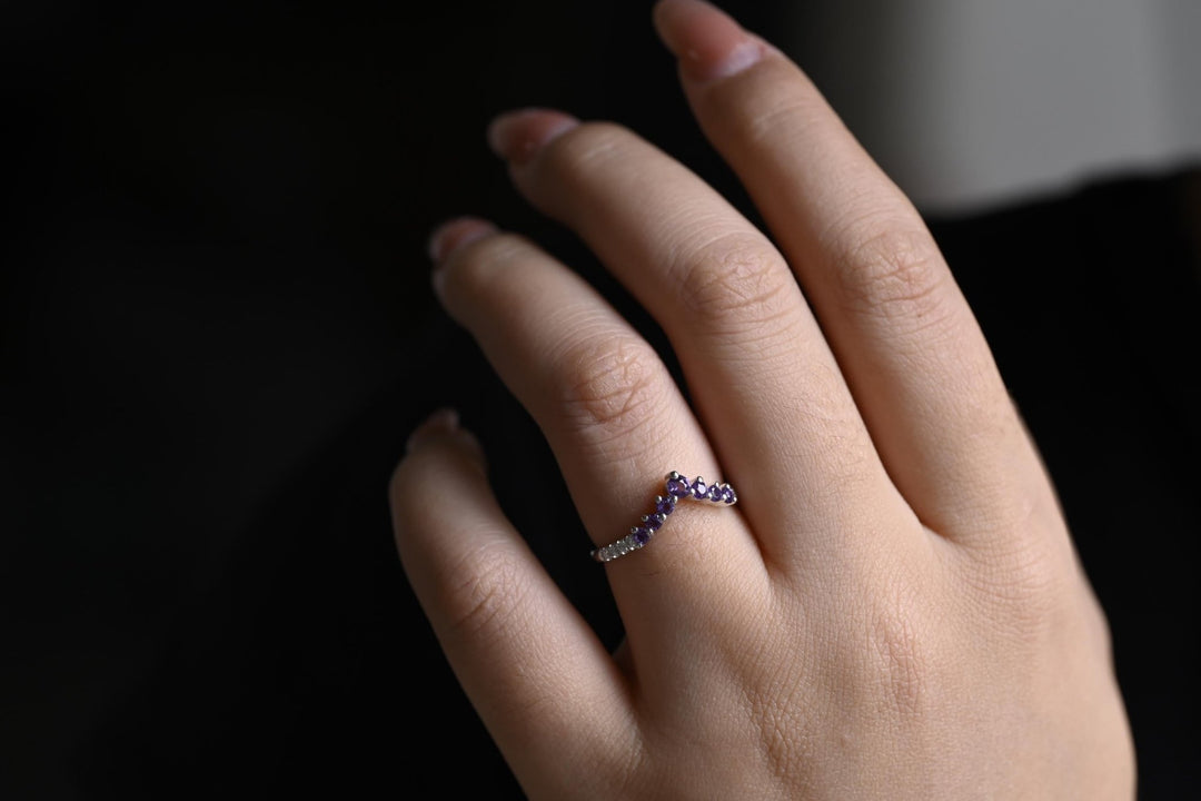 Emerald diamond band stacked with engagement ring