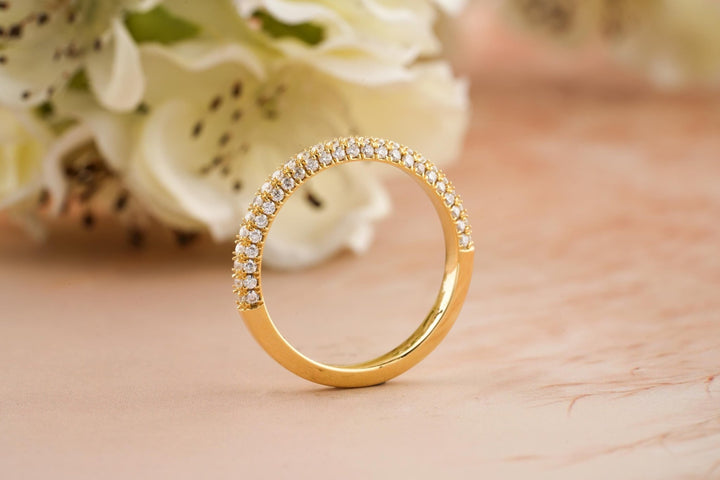 Round lab grown diamond band worn on hand