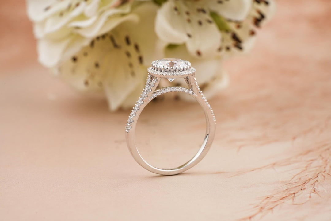 Round split shank ring set with an IGI graded diamond