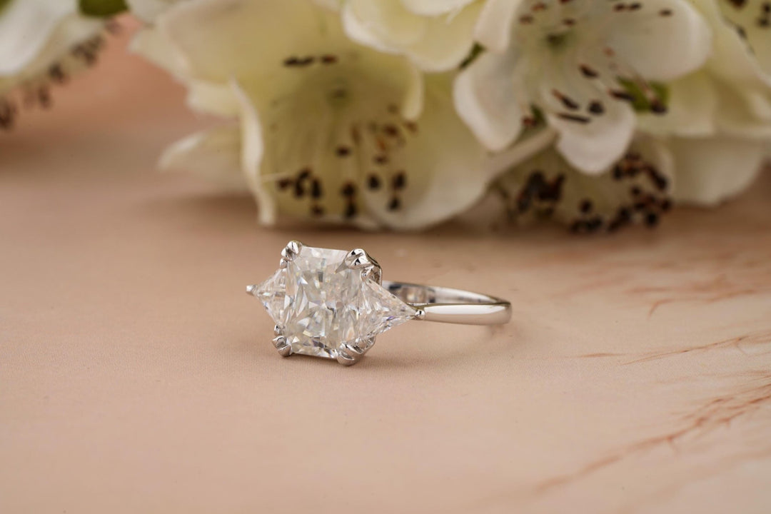 Radiant cut solitaire engagement ring shown in real-life wear