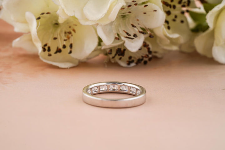 Princess diamond band stacked with engagement ring