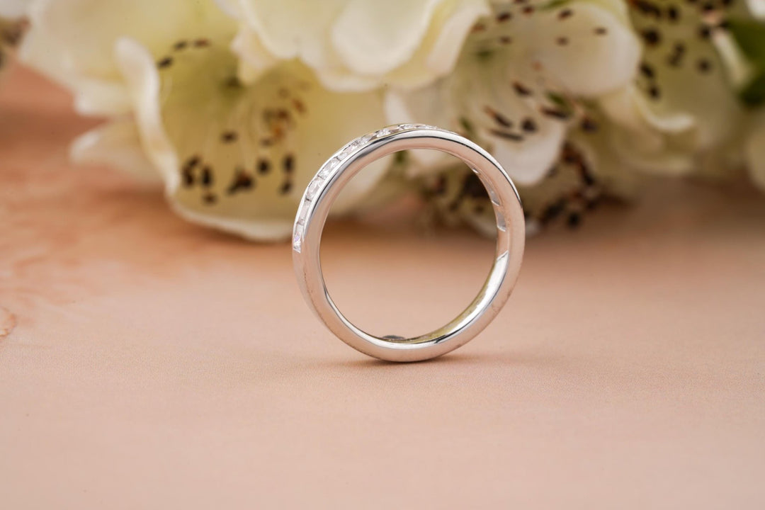 Princess diamond wedding band in yellow gold