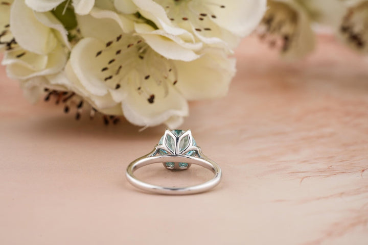 Lifestyle shot of portuguese solitaire diamond ring on hand