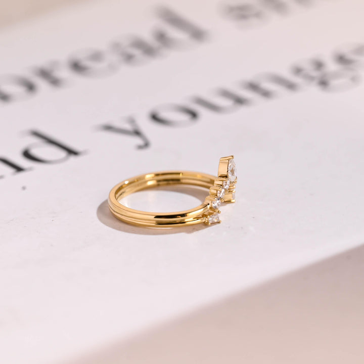 Ethically sourced round & pear & trapezoid diamond eternity band