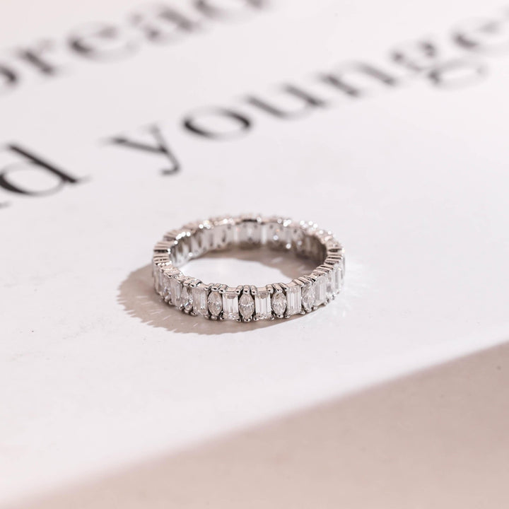 Side view of marquise & baguette diamond wedding band