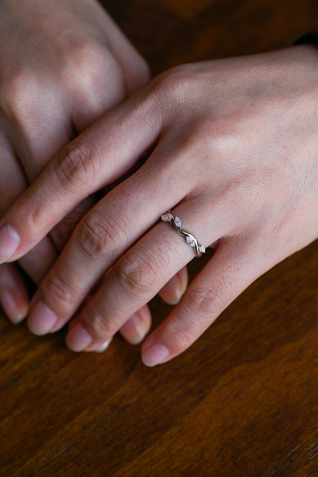 Marquise diamond band stacked with engagement ring