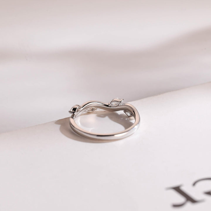 Side view of marquise diamond wedding band