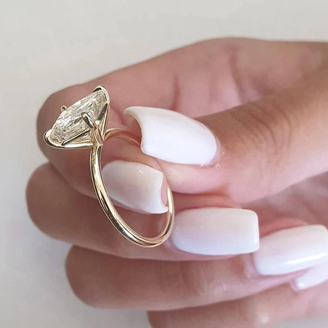 Angled view of cushion cut diamond in solitaire setting