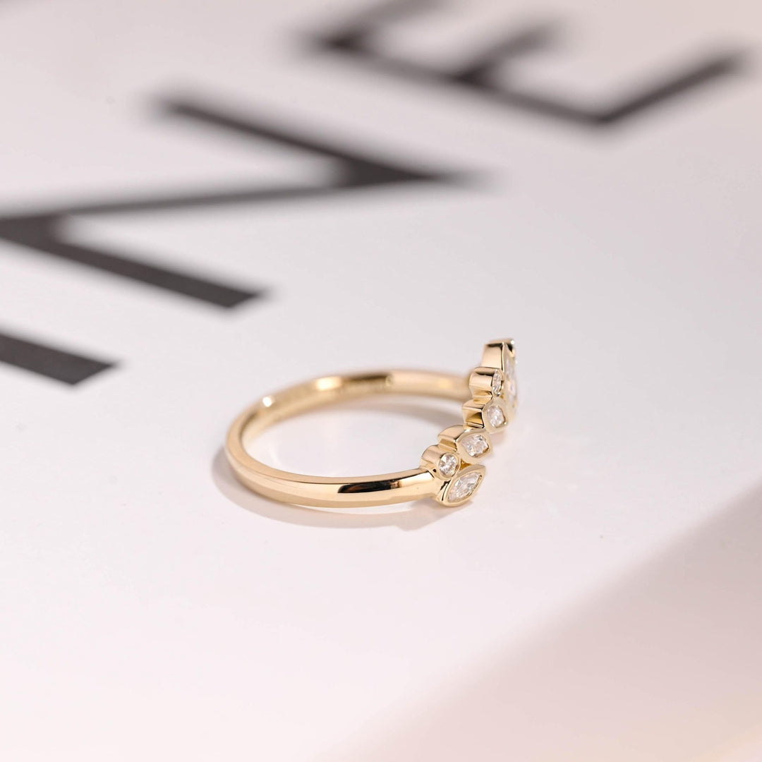 Round diamond wedding band in rose gold