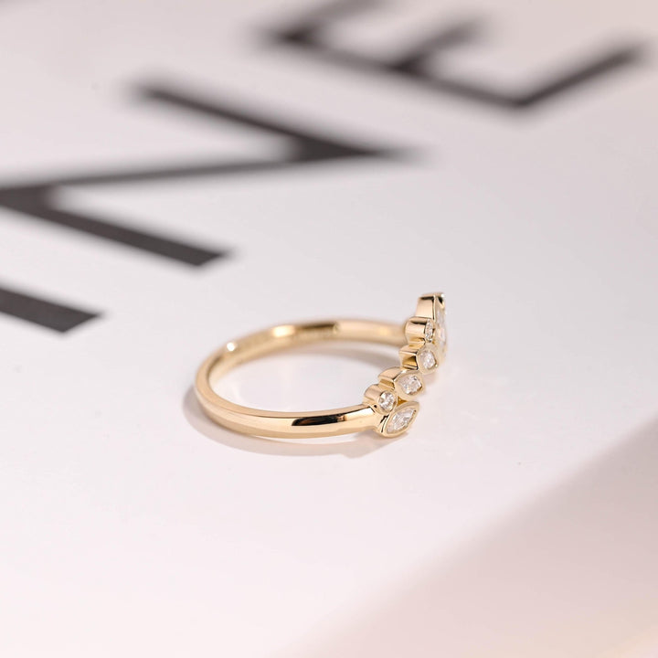 Round diamond wedding band in rose gold