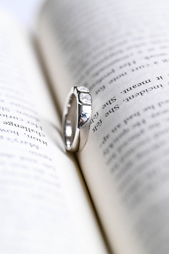 Asscher diamond band stacked with engagement ring