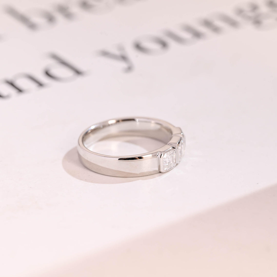 Side view of asscher diamond wedding band