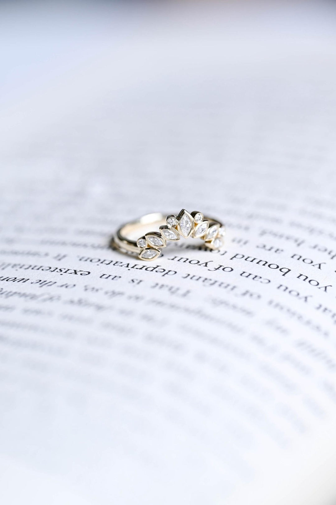 Round diamond band stacked with engagement ring