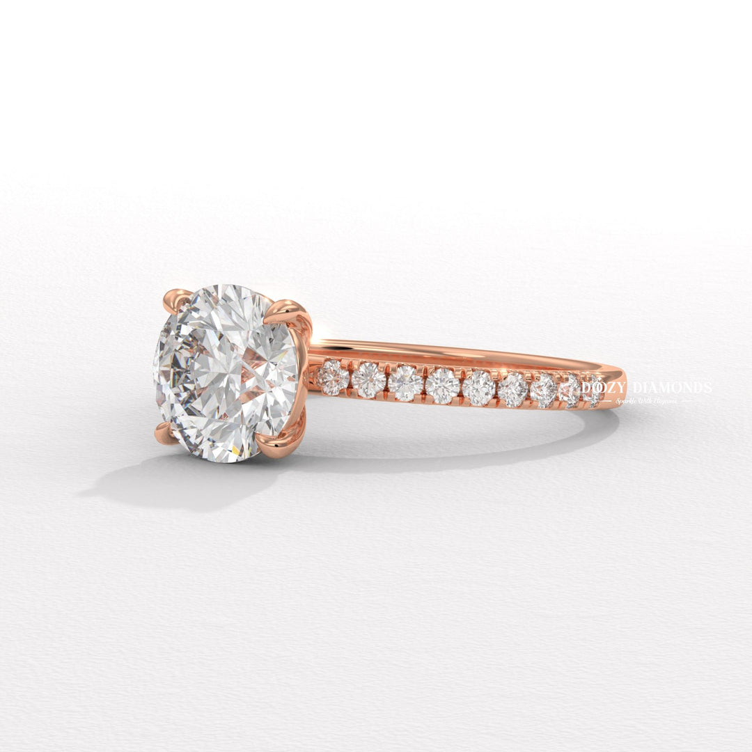 Profile view of round cut pave engagement ring band