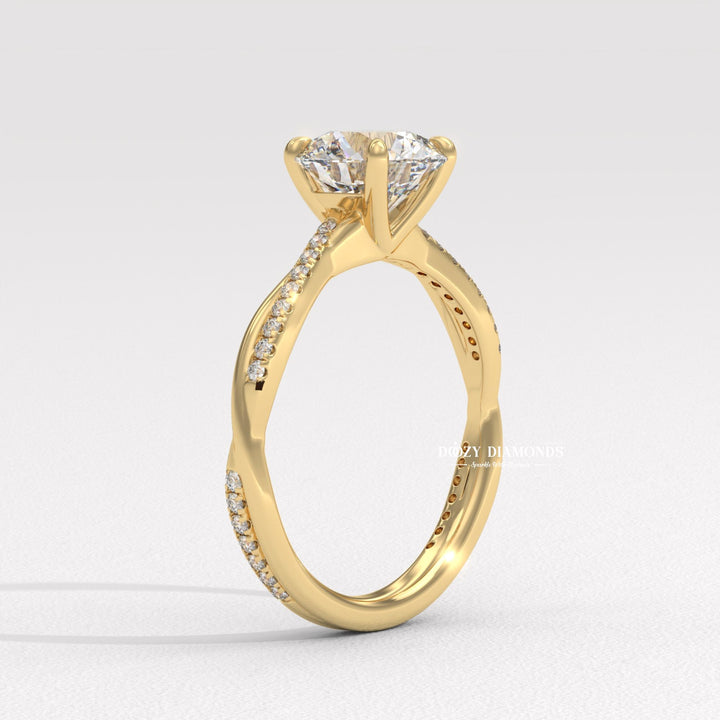 Round solitaire engagement ring viewed from the side
