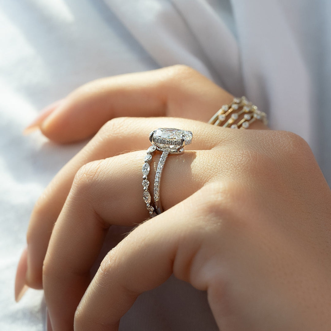 Side angle of oval hidden halo diamond engagement ring