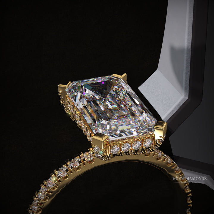 Top-down view of emerald cut hidden halo engagement ring