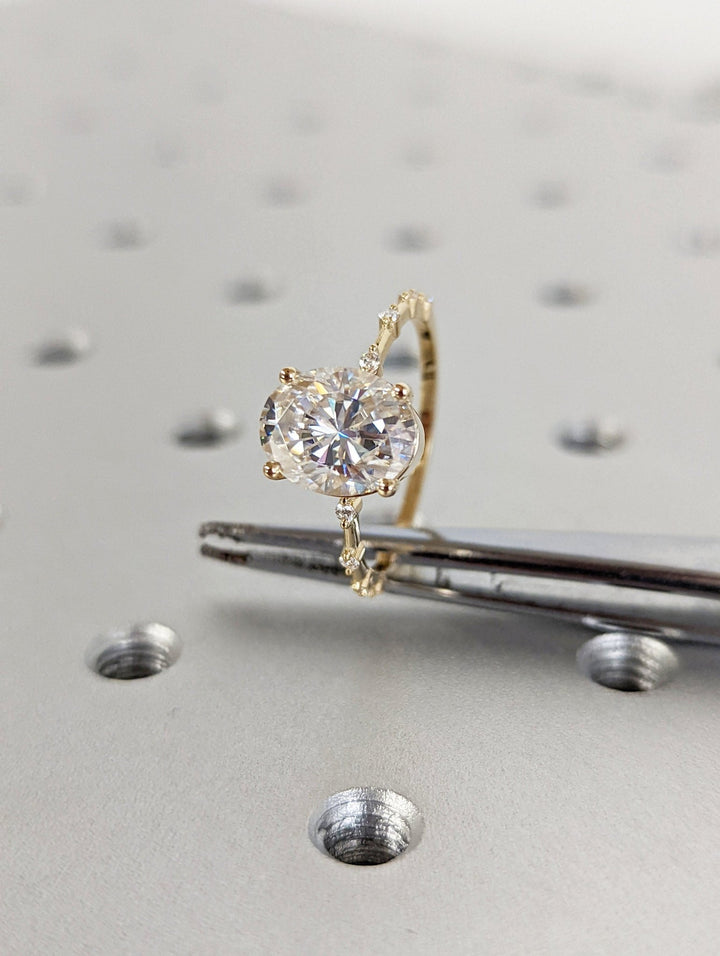 Oval pave engagement ring with IGI certificate and packaging