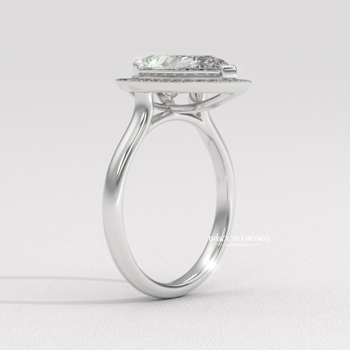Top-down view of pear cut halo engagement ring