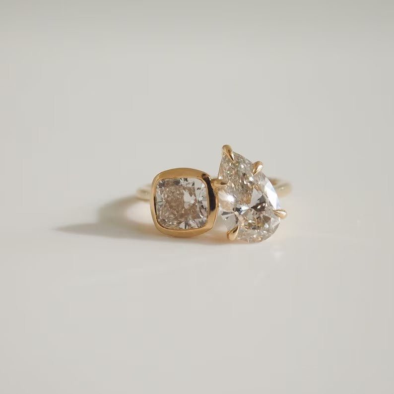 Side angle of pear solitaire diamond engagement ring