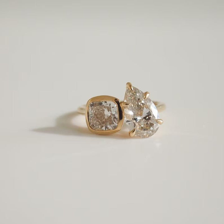Side angle of pear solitaire diamond engagement ring