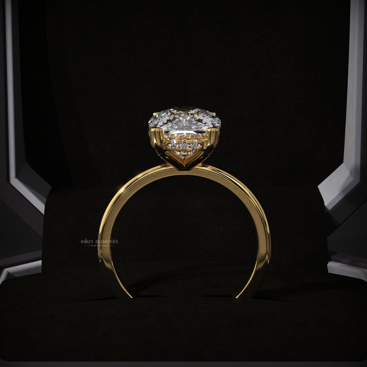 Cushion cut engagement ring shown with authenticity certificate