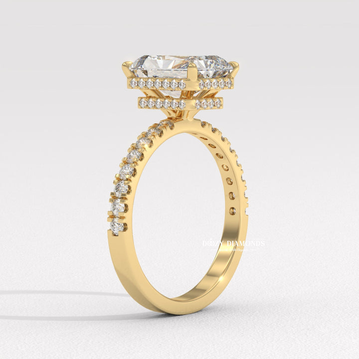 Radiant halo engagement ring viewed from the side
