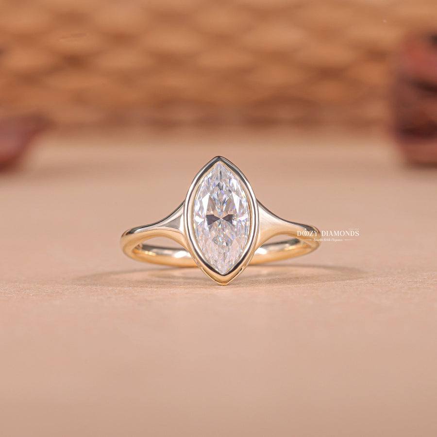 1.50CT marquise cut bezel engagement ring available to buy now