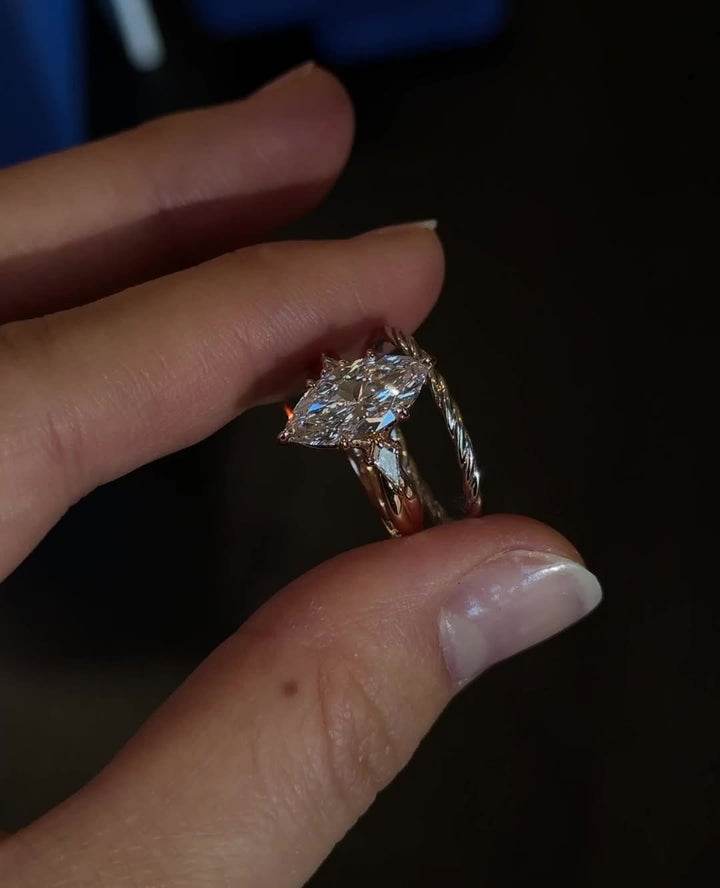 Marquise three stone engagement ring viewed from the side