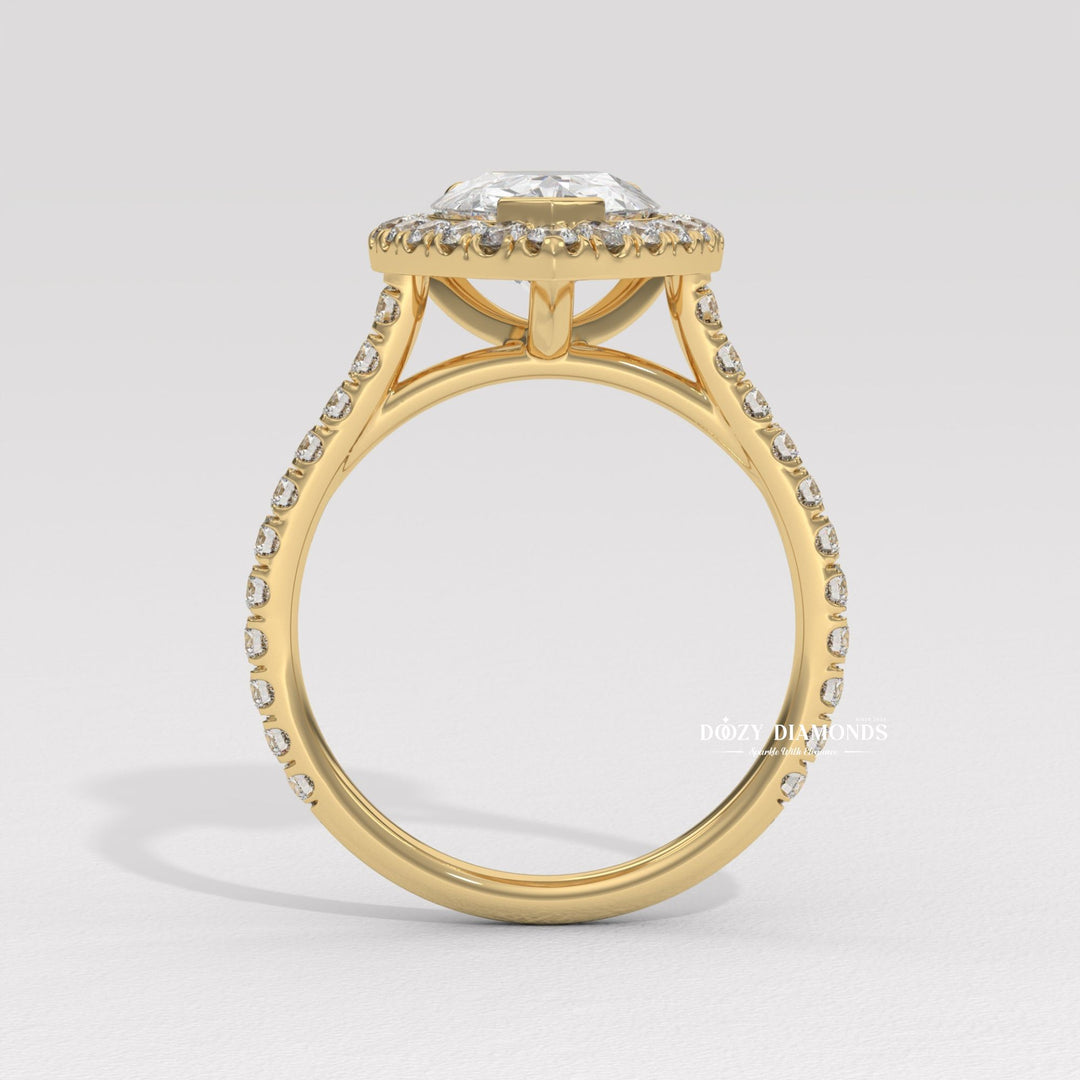 Pear halo engagement ring close-up showing high clarity diamond clarity