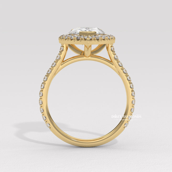 Pear halo engagement ring close-up showing high clarity diamond clarity