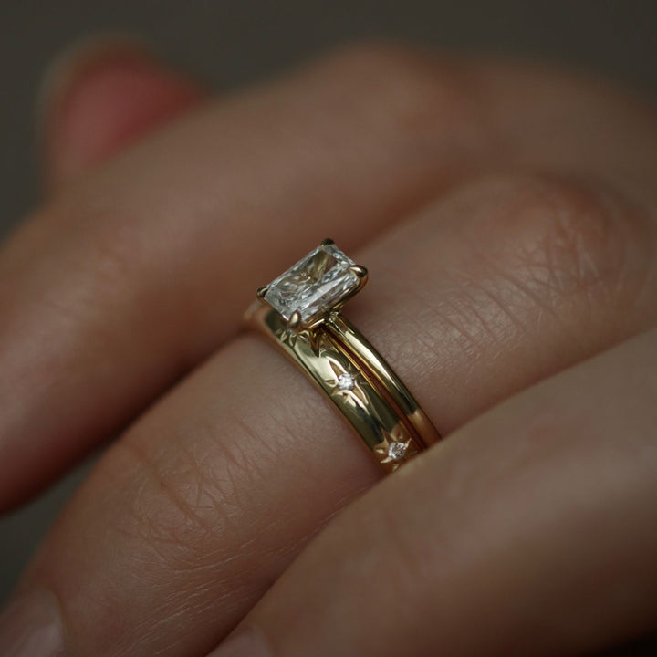 Radiant cut solitaire engagement ring shown in real-life wear