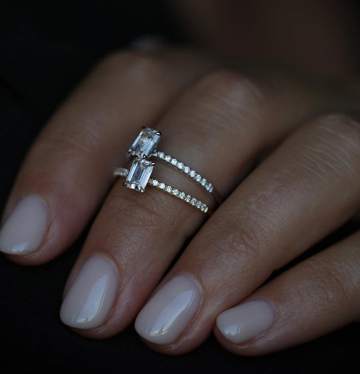 Emerald solitaire diamond engagement ring available in multiple metals