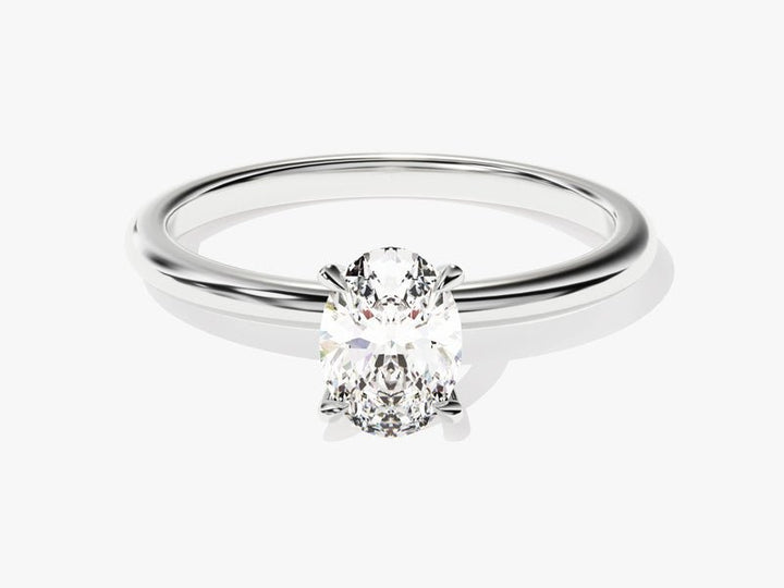 Close-up of oval cut center diamond in solitaire engagement ring
