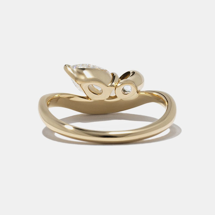 Oval bezel engagement ring offered in gold and platinum